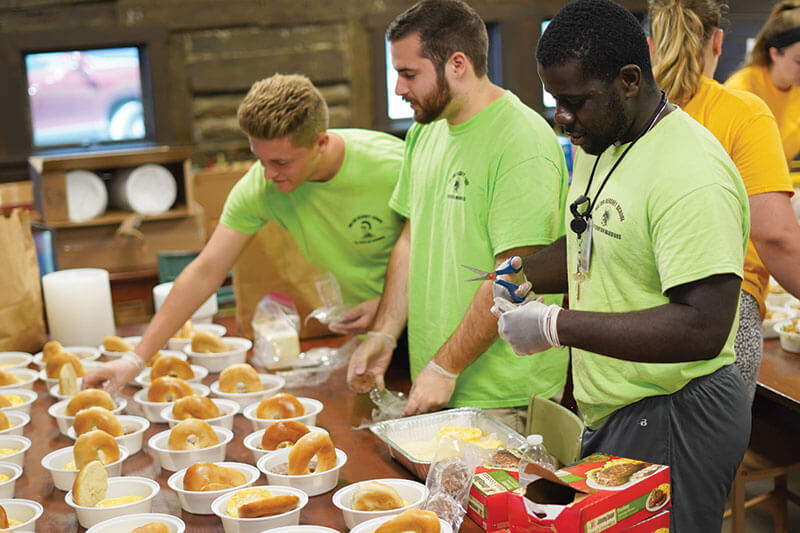 MHS students preparing cocoa packs.