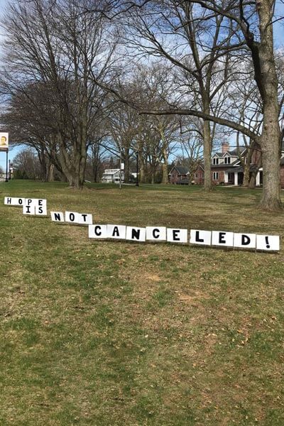 Hope is Not Canceled Sign in Yard