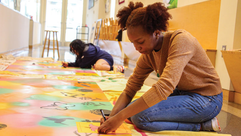 MHS student working on a craft