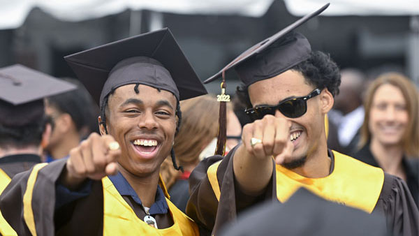 MHS students showing rings at graduation