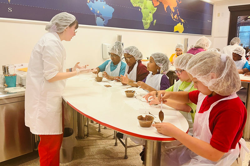 MHS students working on a craft in the kitchen