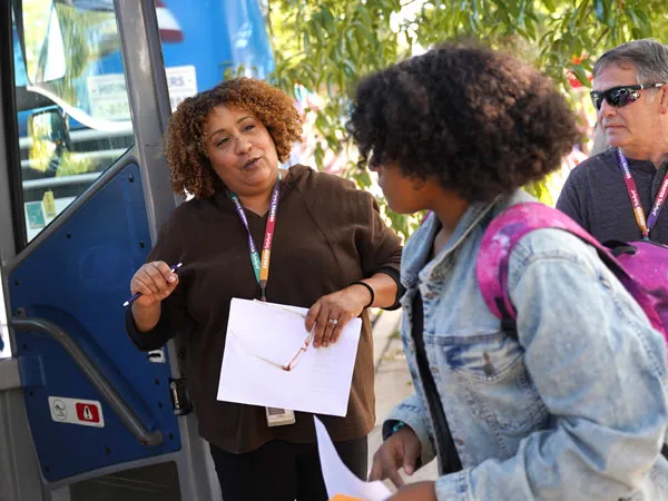 Hilda Dimopoulos with student