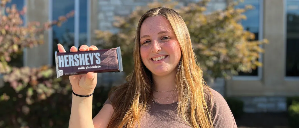 Khloe Walker holding Hershey bar