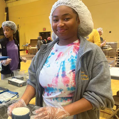 MHS student working in kitchen