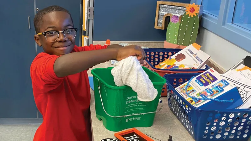 MHS student cleaning supplies