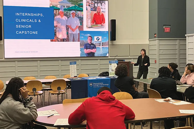 MHS students listening to a presentation