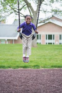 student swinging