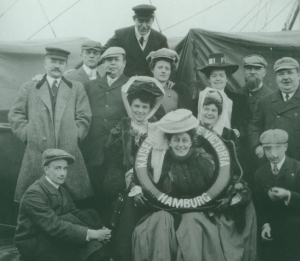 Milton and Catherine Hershey pose with friends on a ship during their travels.