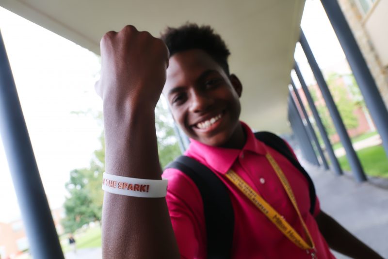 Student wearing a rubber bracelet