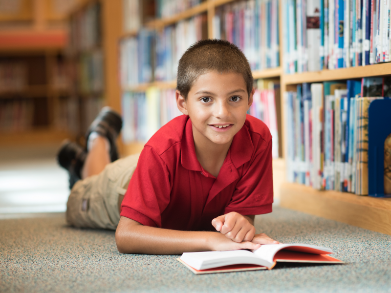 Elementary student with book