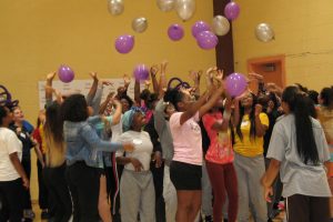 students dance during Girls Grace event