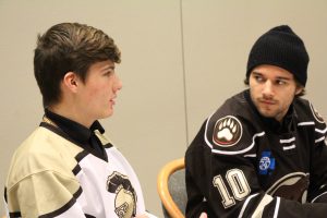 Hershey Bears players visit with MHS students