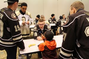 Hershey Bears players visit with MHS students