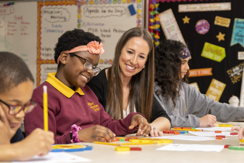 Milton Hershey School students working on projects alongside their teacher
