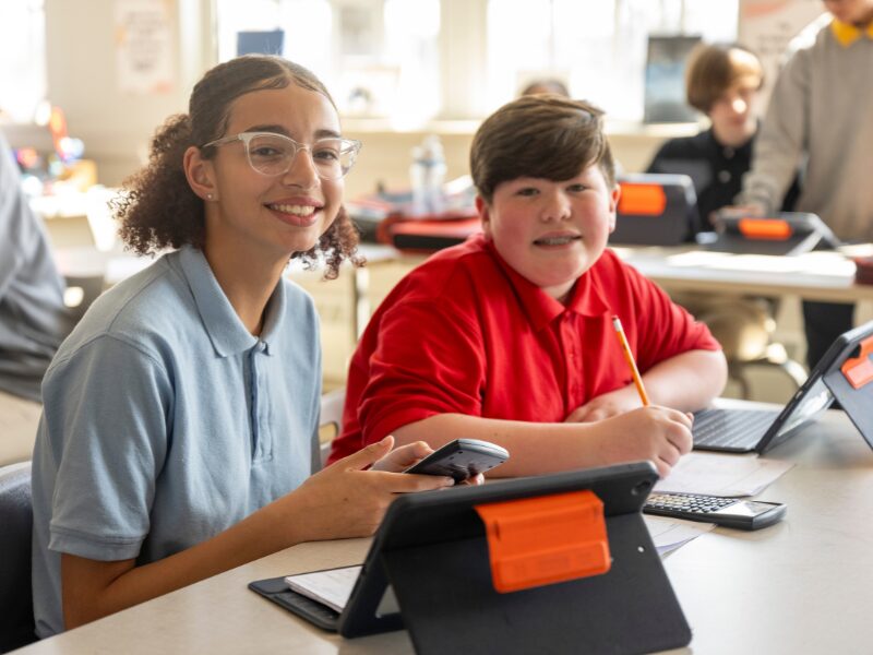 middle division students staying informed on their tablets