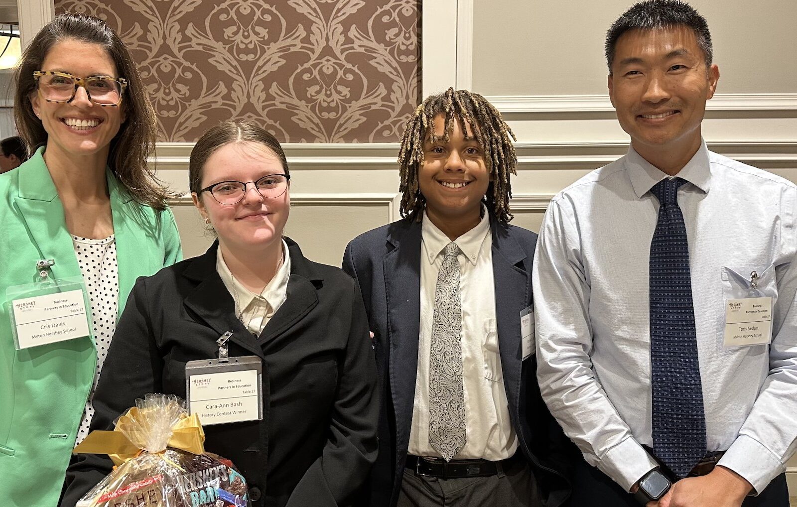 Cara-Ann Bash and Jonah Jervey-Hill with Middle Division teachers.