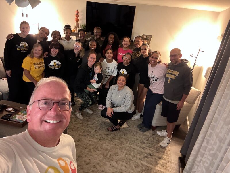 MHS President Pete Gurt with the Volleyball Team