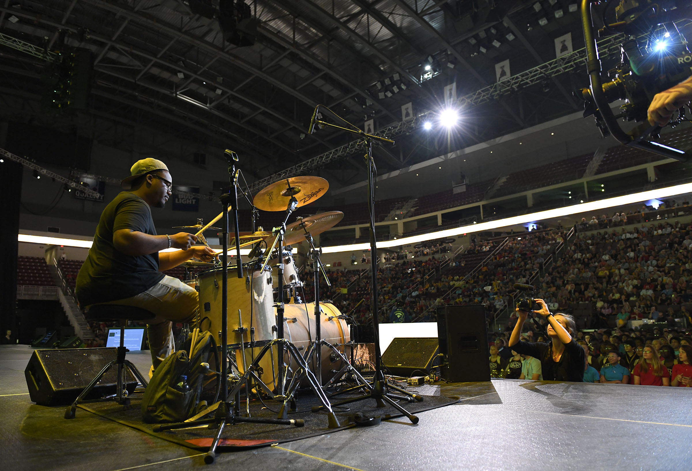Milton Hershey School alumnus Andre Sumler ’17 plays the drums during the 2019 Opening of School Assembly.