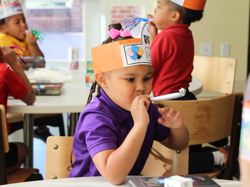 MHS student celebrating Milton Hershey's birthday