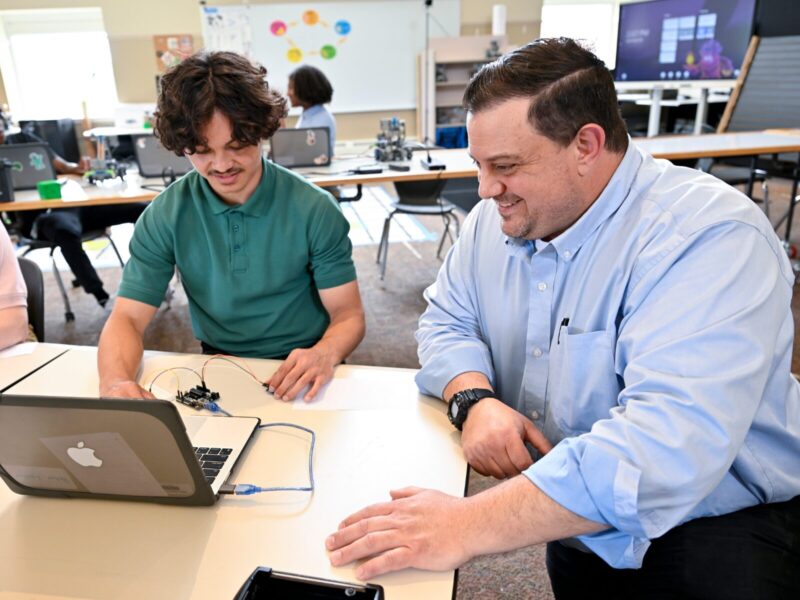 cte computer tech instructor with a student