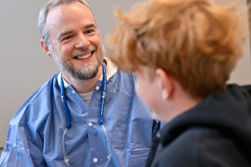 MHS dentist with a patient