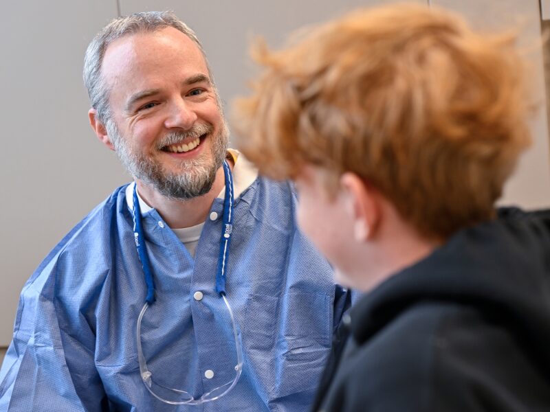 MHS dentist with a patient