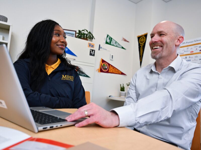 GPS counselor helping student apply to college