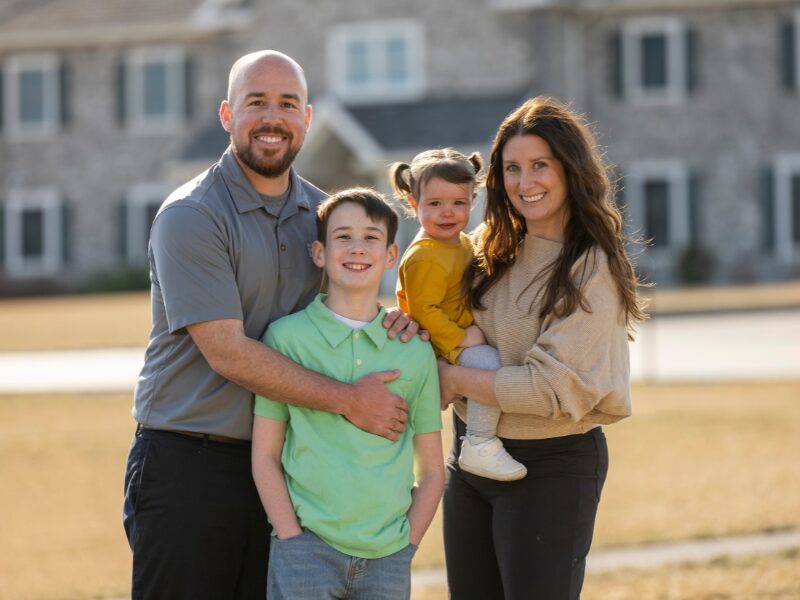 Houseparents Weston and Elizabeth Parrett with their children outside