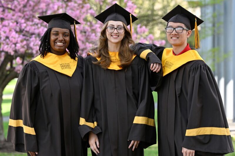 MHS seniors outdoors near blossom trees