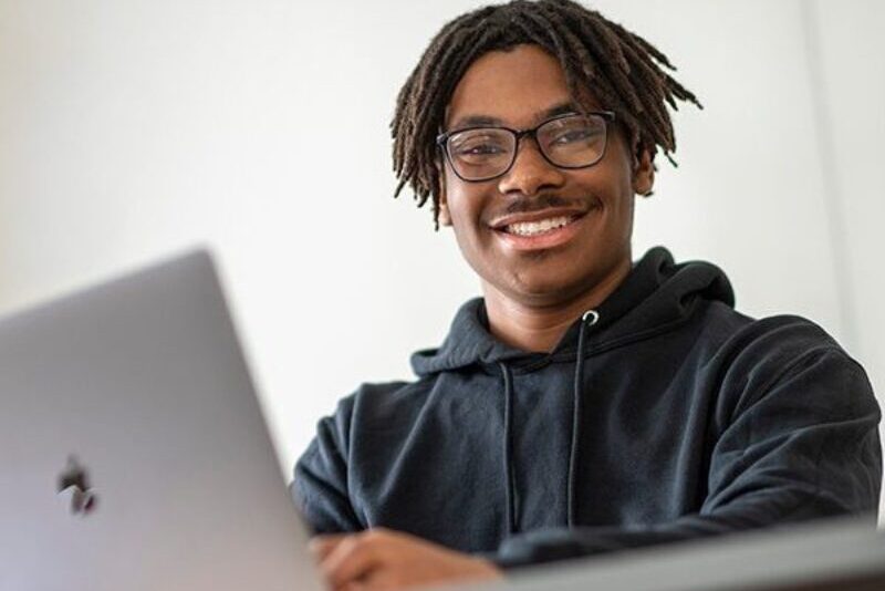 MHS student using school-provided technology