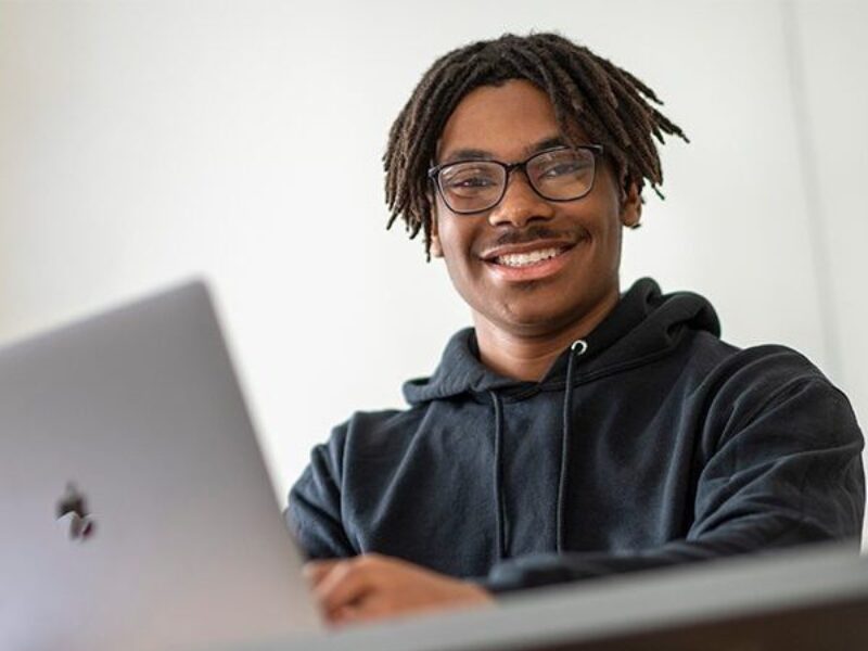 MHS student using school-provided technology