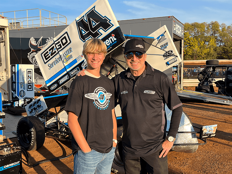 Milton Hershey School student with World of Outlaws senior leadership.