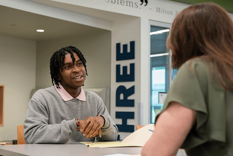 Milton Hershey School student sits during his mock interview.