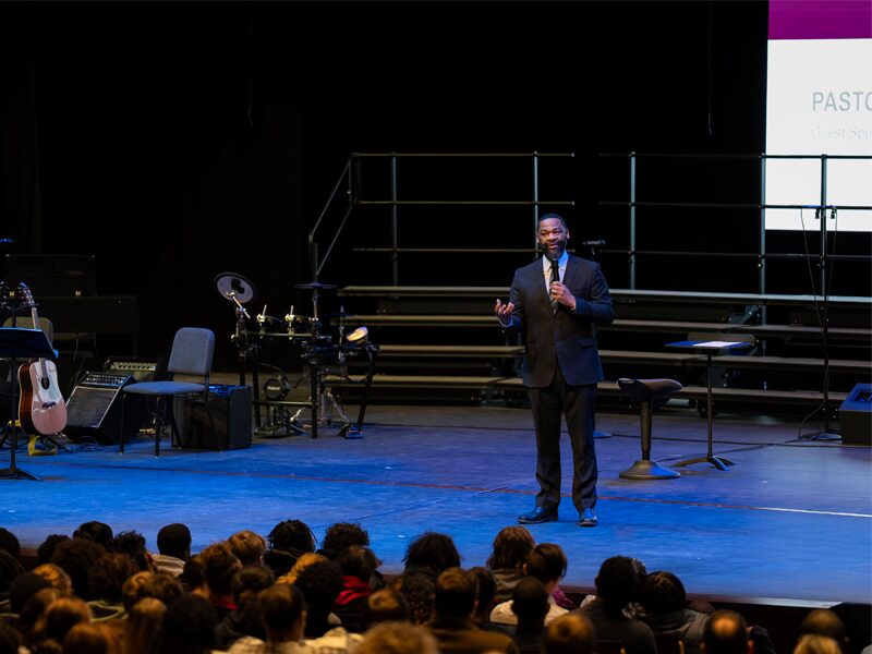 Pastor Larry Colbert delivers remarks during the during the 2024 Martin Luther King Jr. Day Assembly.