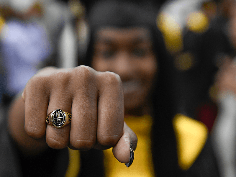 Milton Hershey School student holds up their class ring