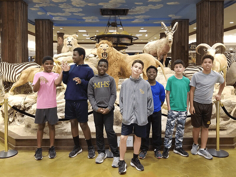 Milton Hershey School fifth-grader, Cash Godwin, visits a museum with his student home.