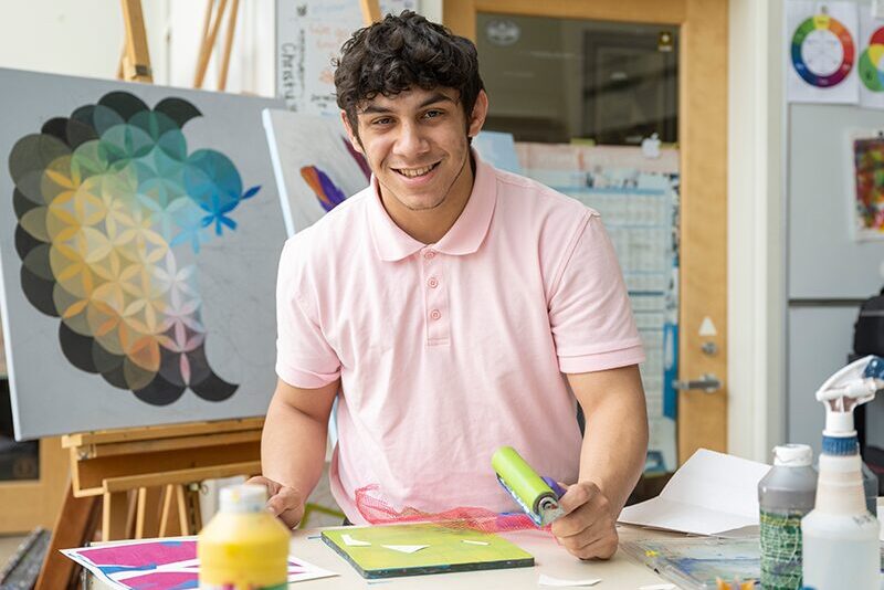 high school student in art class