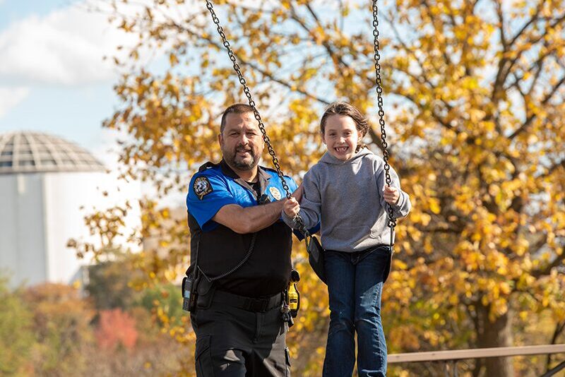 Campus Safety officer with elementary student
