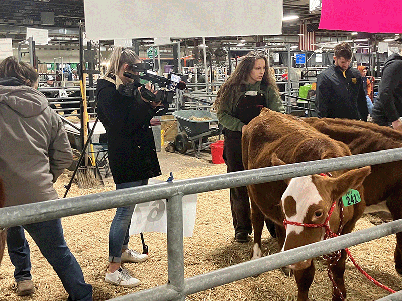 Milton Hershey School student is interviewed by cbs21 at the PA Farm Show.