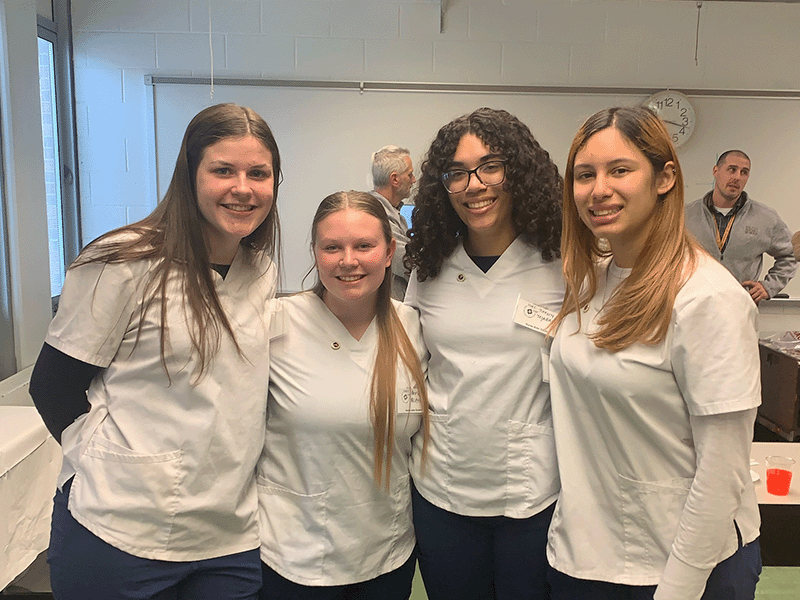 Milton Hershey School students stand together after earning their CNAs. 