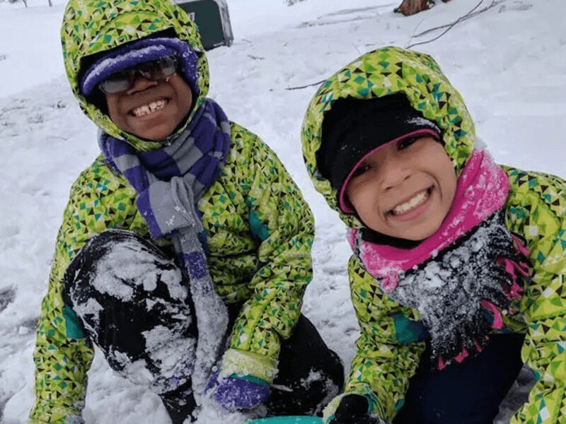 Milton Hershey School students playing in the snow.