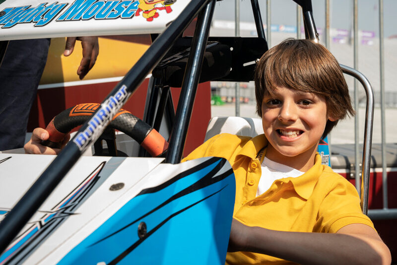 A student enjoys the Hershey Sprint Car Experience.