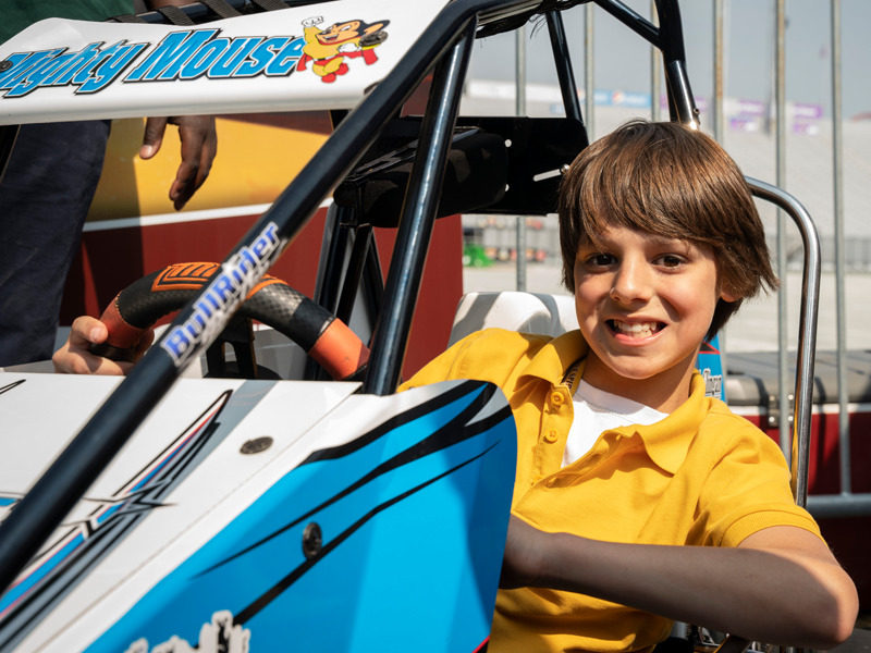 A student enjoys the Hershey Sprint Car Experience.