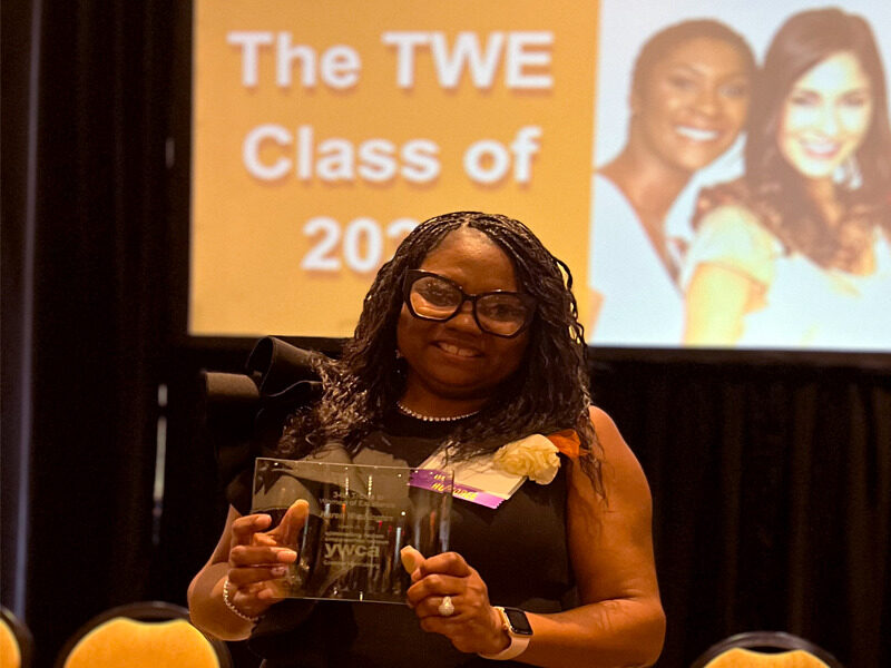Karen Washington, Milton Hershey School houseparent and 2023 Tribute to Women of Excellence honoree stands with her award.