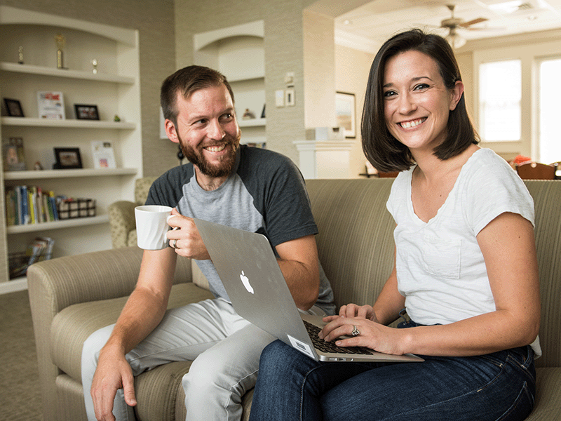 Justin and Dedra Doutrich, Milton Hershey School former houseparents, sit in a student home. 