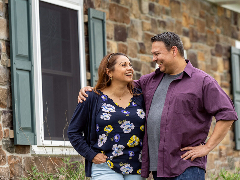 Milton Hershey School houseparents outside of student home