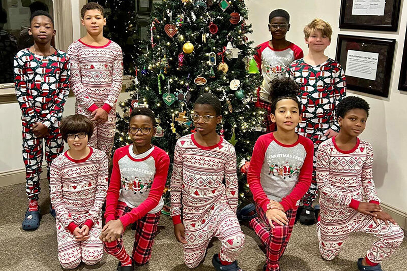 Milton Hershey School's student home Carousel wear matching pajamas as part of their Countdown to Christmas. 