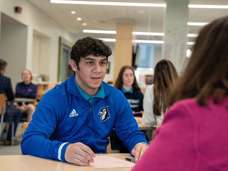 Milton Hershey School student sits during his mock interview.