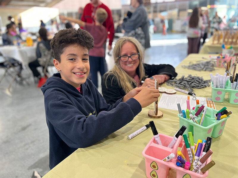 Milton Hershey School parents/sponsors partake in crafts at Fall Family Weekend