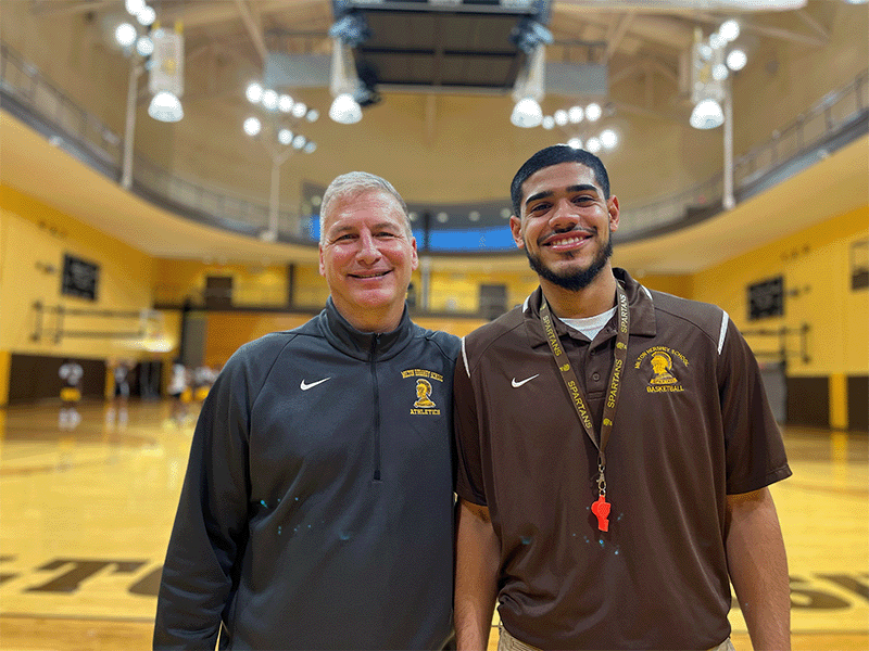 Milton Hershey School alumnus, Pedro Rodriguez '18, coaches varsity boys' basketball.